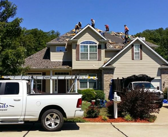 Professional roof contractors from Edward's Roofing and Exteriors in action